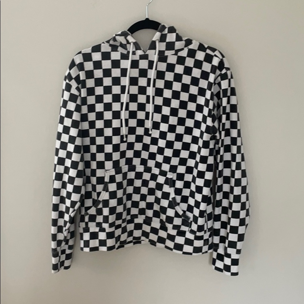 Checkered black and white hoodie.